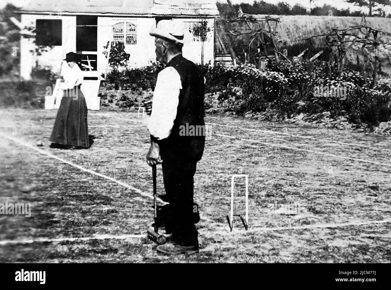 Playing croquet, possibly 1870s Stock Photo