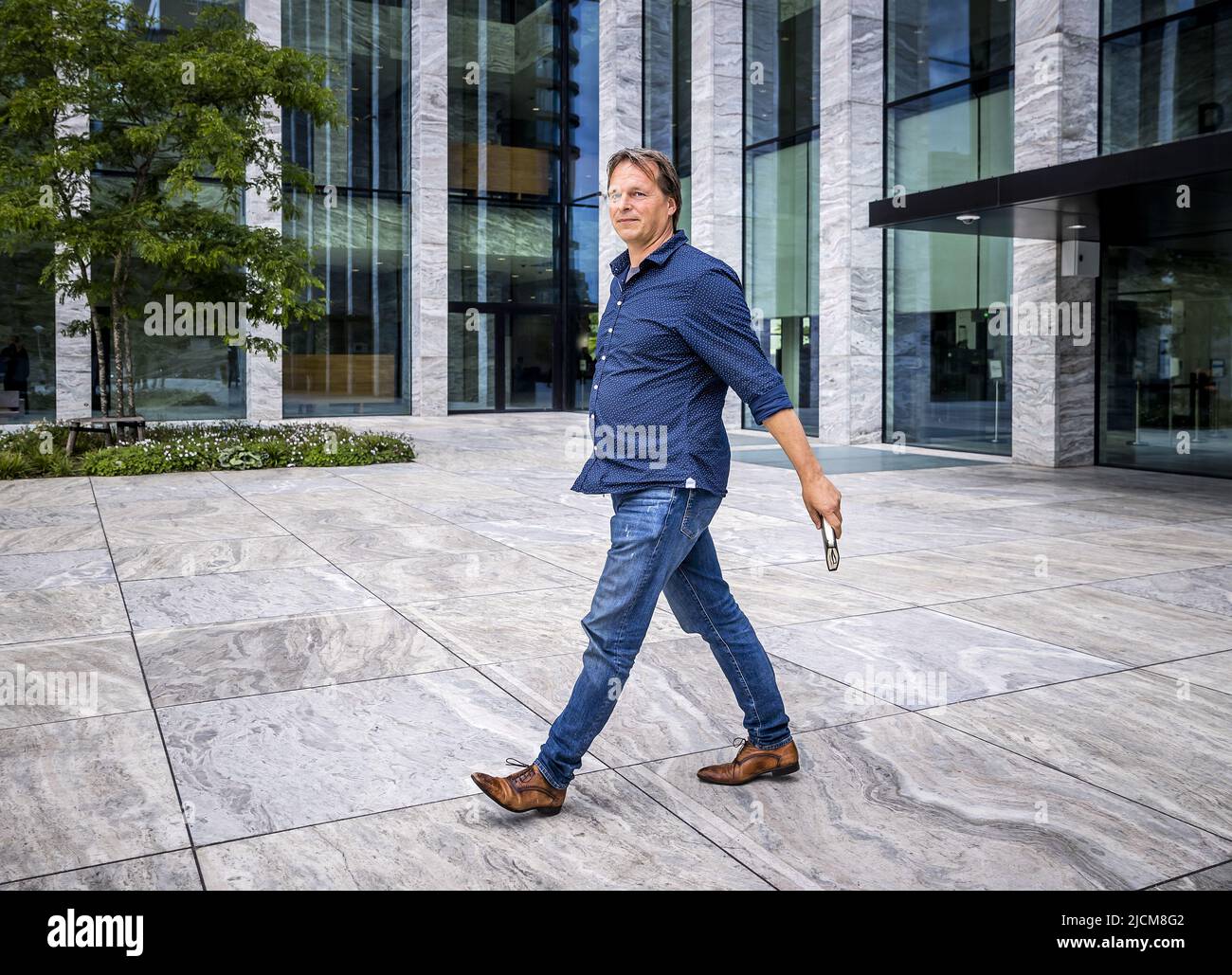 2022-06-14 13:25:36 AMSTERDAM - Camille van Gestel, a business partner of  Sywert van Lienden, leaves the court of Amsterdam during a suspension where  it is decided whether van Lienden, and other involved