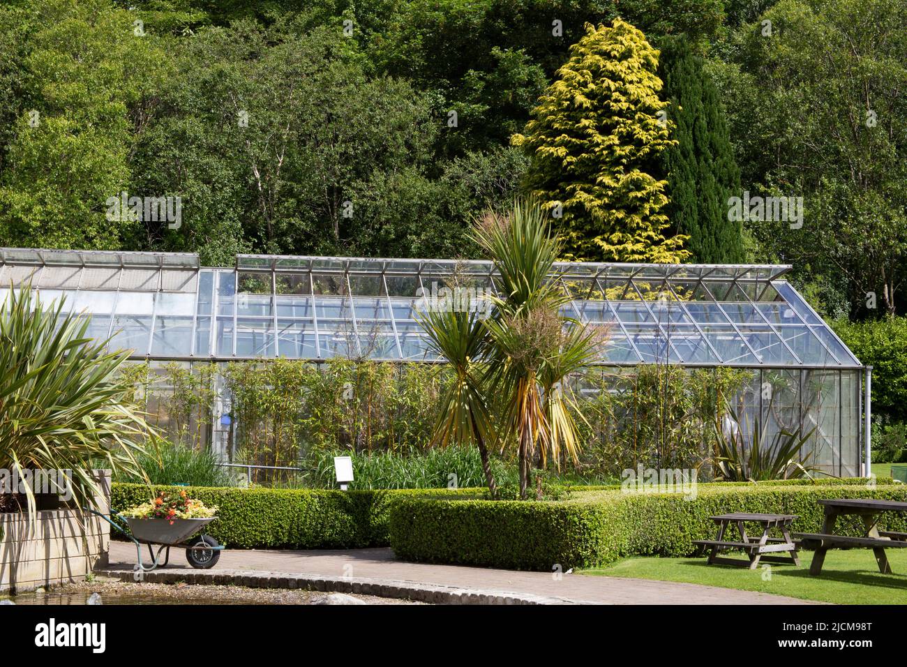 The greenhouse and formal garden at the Durham University Botanic Garden, England UK Stock Photo