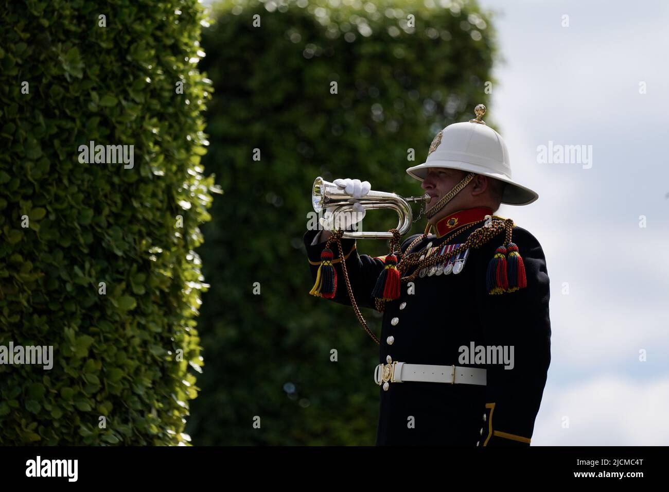 The Last Post is played by Bugler Cpl David Nevatte, during a service