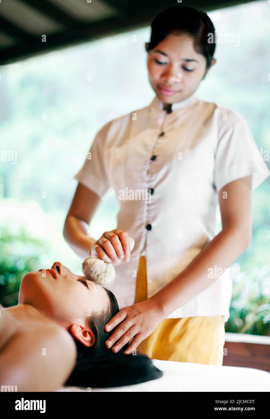 Young woman receiving Ayung Beauty Secret treatment at Ayung Spa, Ubud Hanging Gardens, Bali