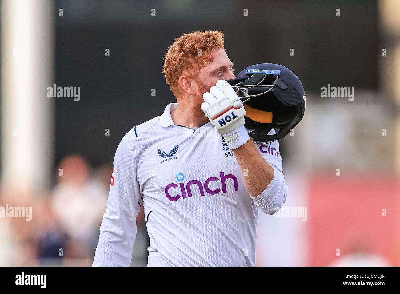 Nottingham, UK. 14th June, 2022. Jonny Bairstow of England kisses his helmet as he knocks up a century in Nottingham, United Kingdom on 6/14/2022. (Photo by Mark Cosgrove/News Images/Sipa USA) Credit: Sipa USA/Alamy Live News Stock Photo