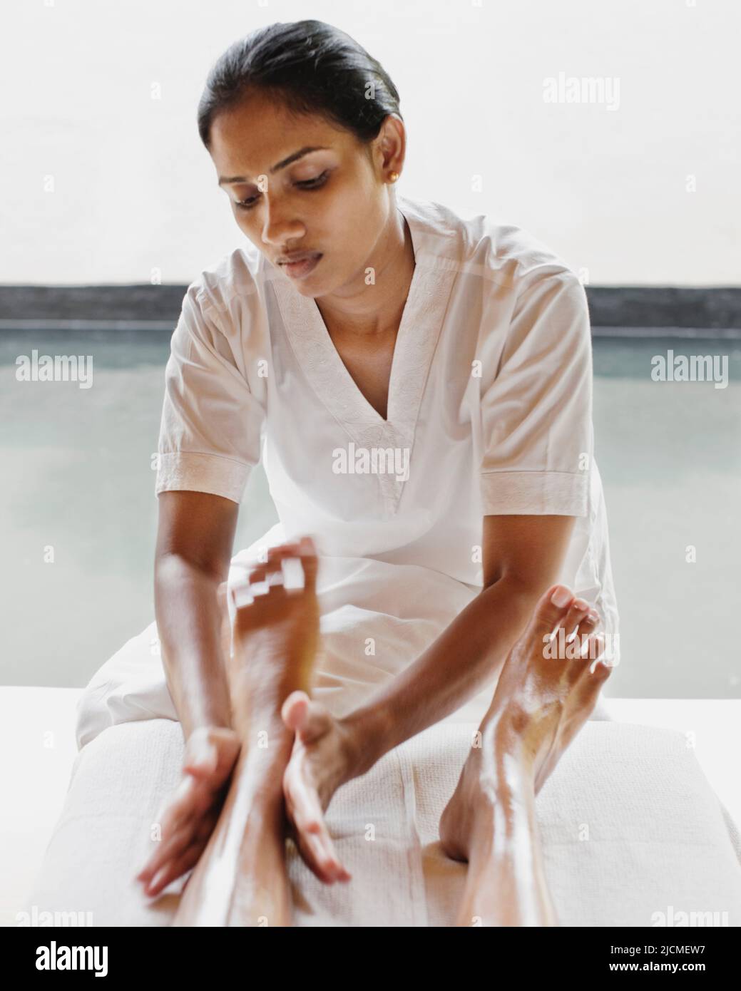 A woman receives a Thai Reflexology Treatment at a spa in Sri Lanka