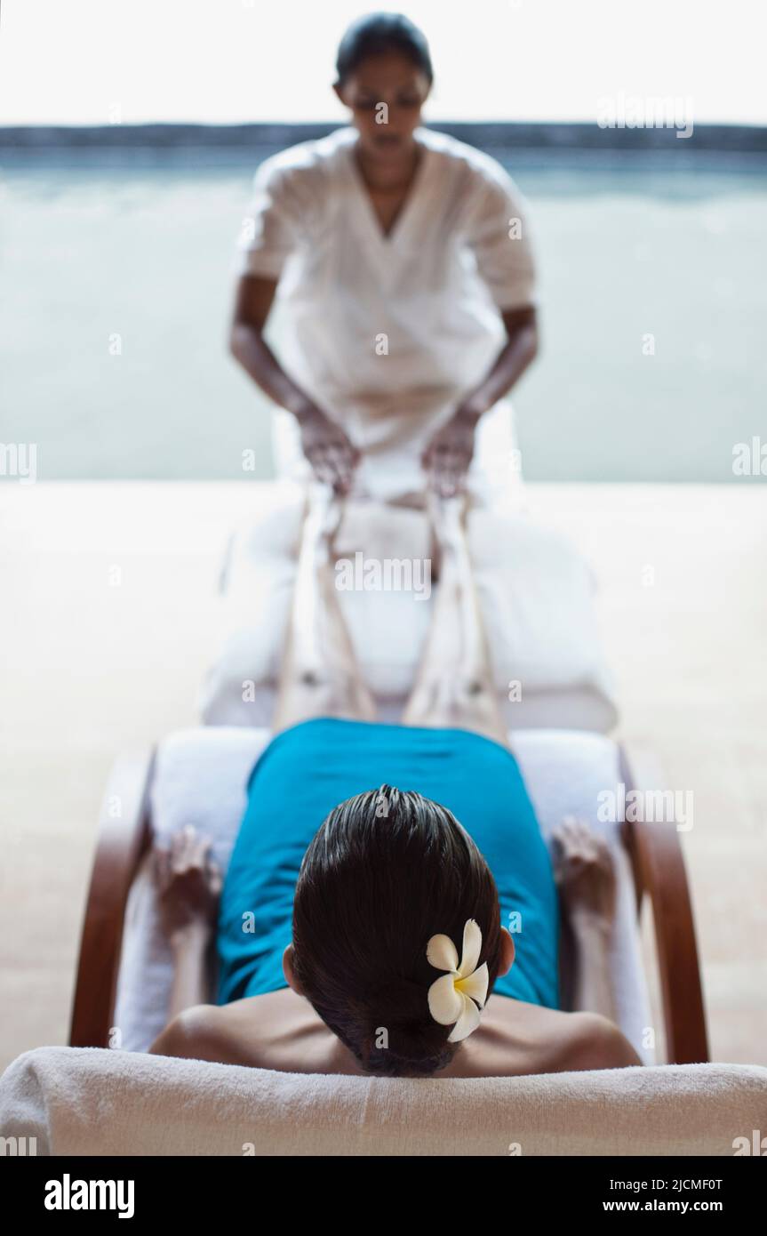 A woman receives a Thai Reflexology Treatment at a spa in Sri Lanka