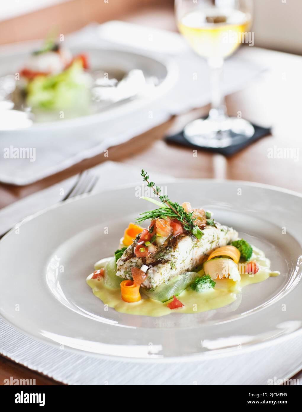 Kingfish panfried in olive oil with poached vegetable ribbons and