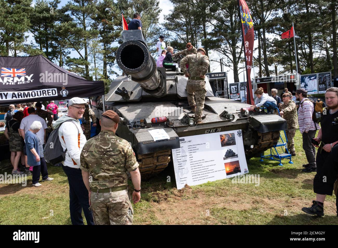 Massive Chieftain tank as part of the Army display at the Royal Cornwall show. Climbed all over by children and adults. Soldiers keeping people safe. Stock Photo