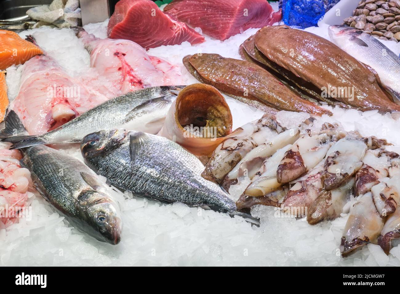 Market stall with fish and seafood seen in Barcelona Stock Photo