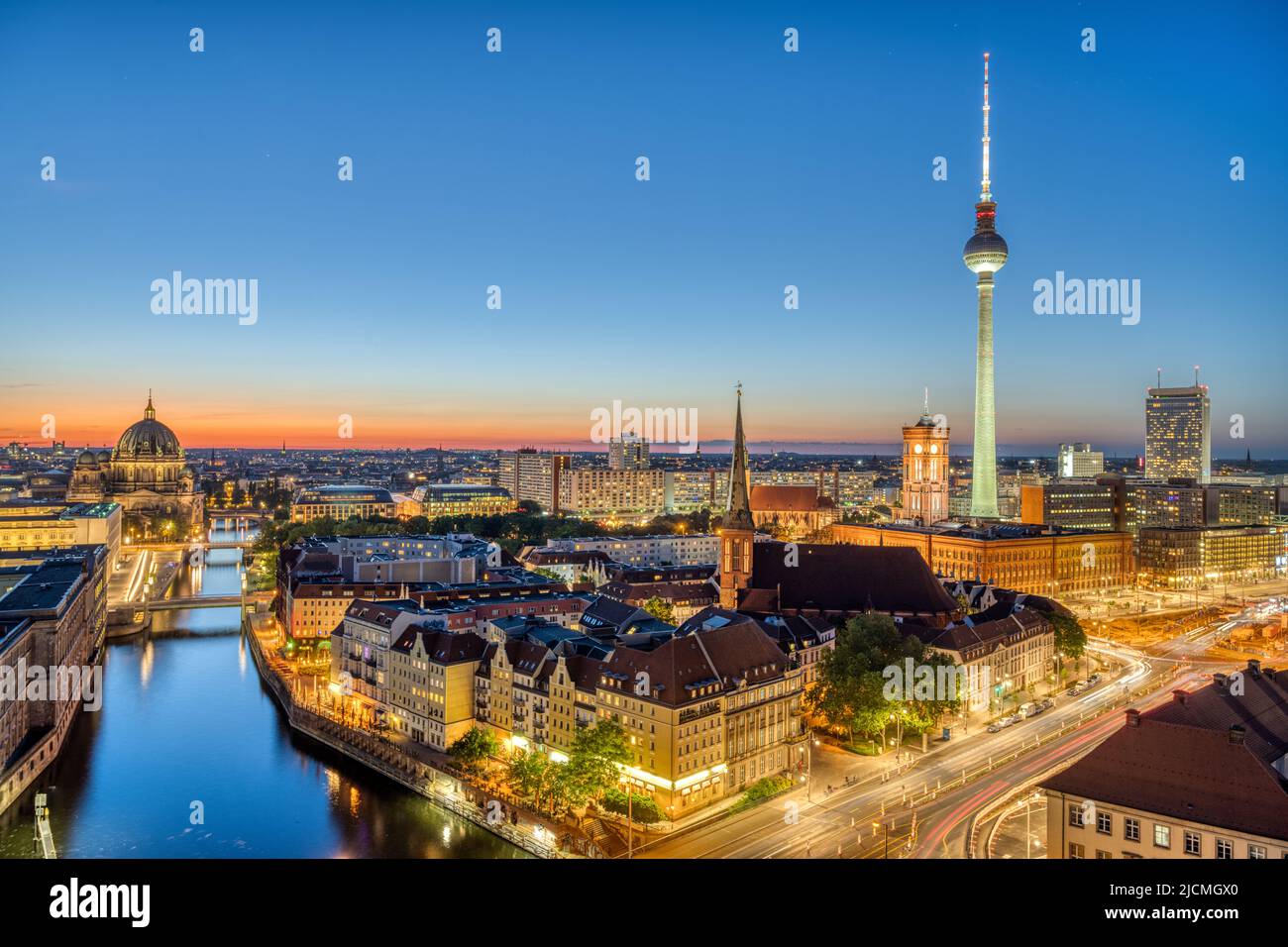Downtown Berlin at dusk with the TV Tower, the river Spree and the cathedral Stock Photo