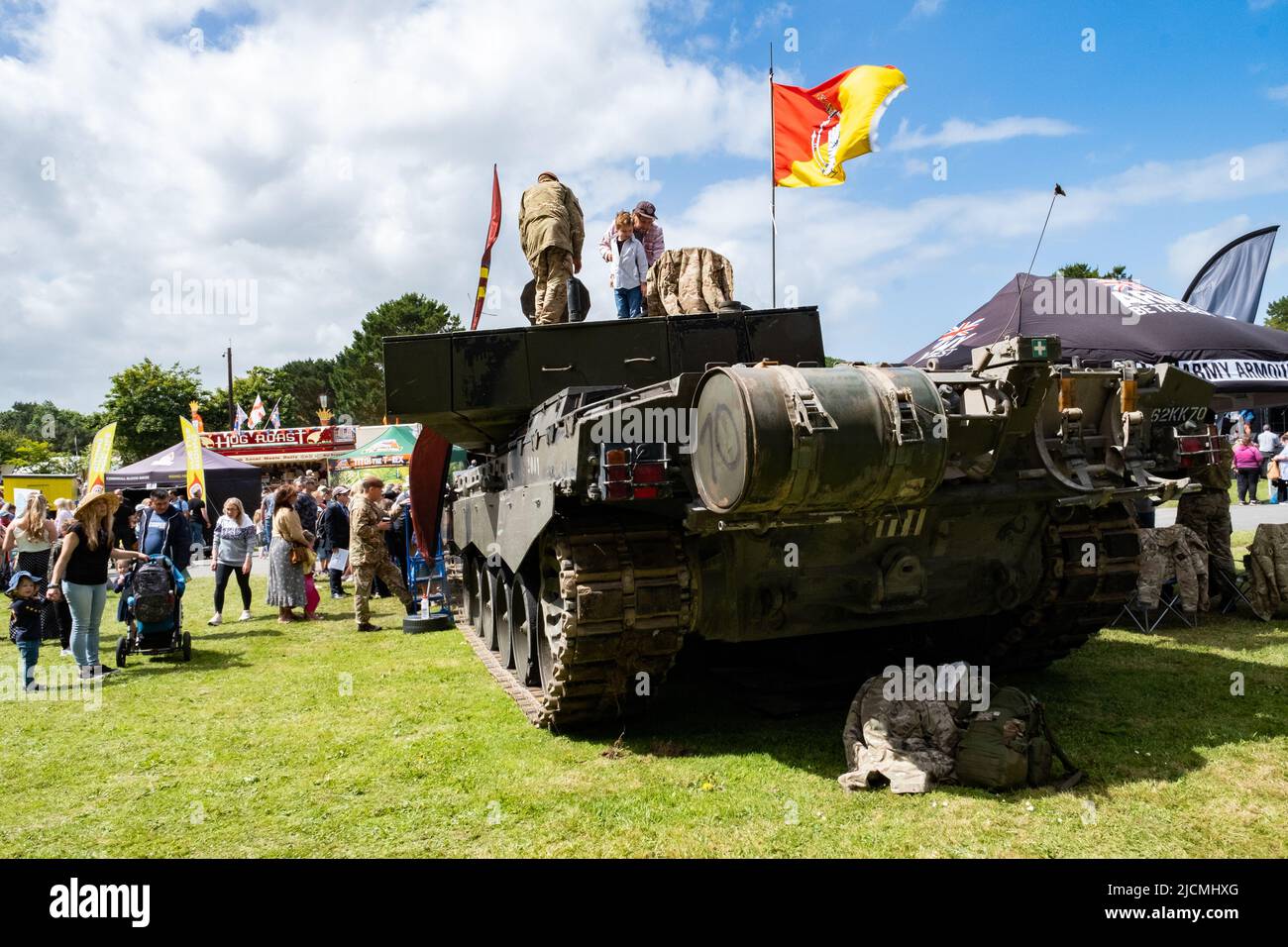 Massive Chieftain tank as part of the Army display at the Royal Cornwall show. Climbed all over by children and adults. Soldiers keeping people safe. Stock Photo