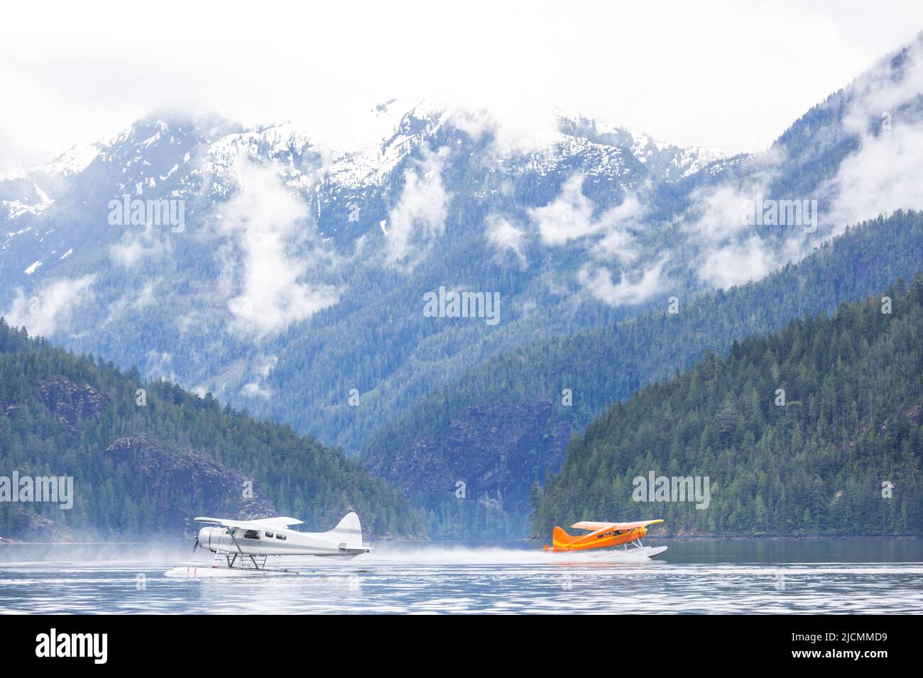 Float Plane in the mountains lake, Canada Stock Photo - Alamy
