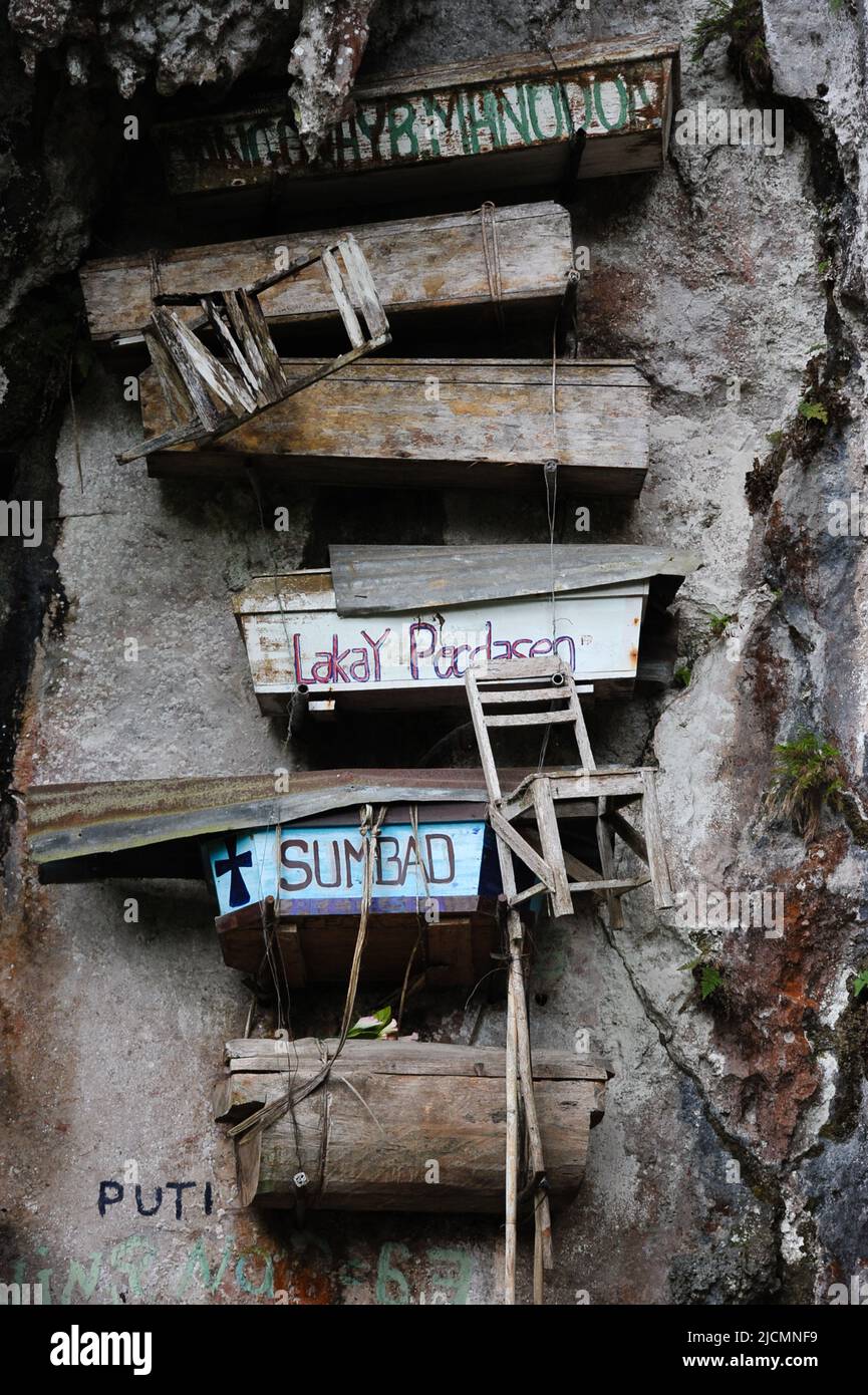 Mountain Province, Philippines: Sagada Hanging Coffins with wooden 'death chairs', where the deceased was displayed in their home prior to burial. Stock Photo