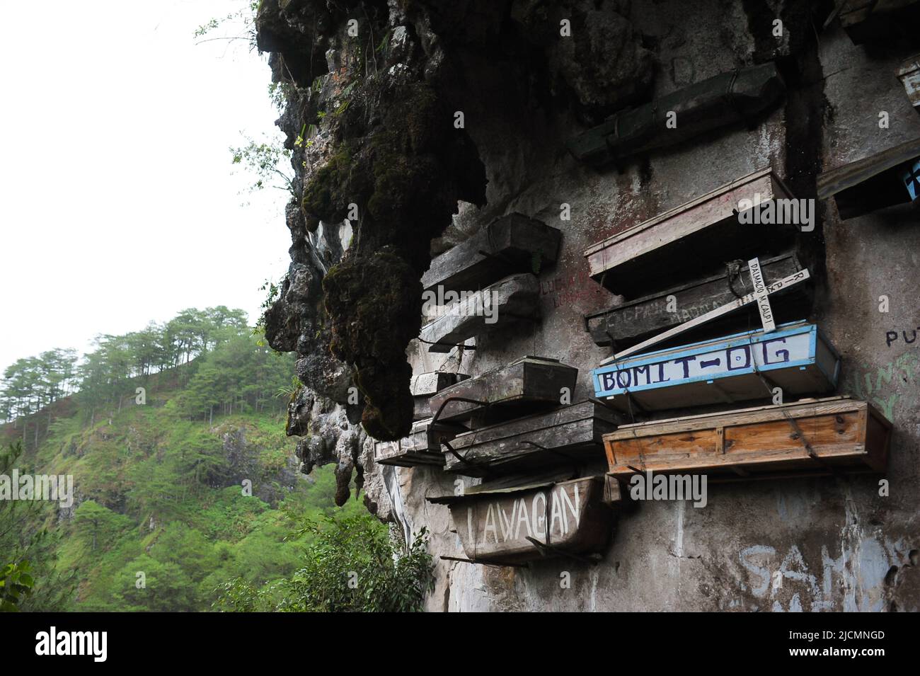 Mountain Province, Philippines: Sagada Hanging Coffins, the unique burial ritual of the indigenous Kankanaey people of tying caskets on cliff faces. Stock Photo