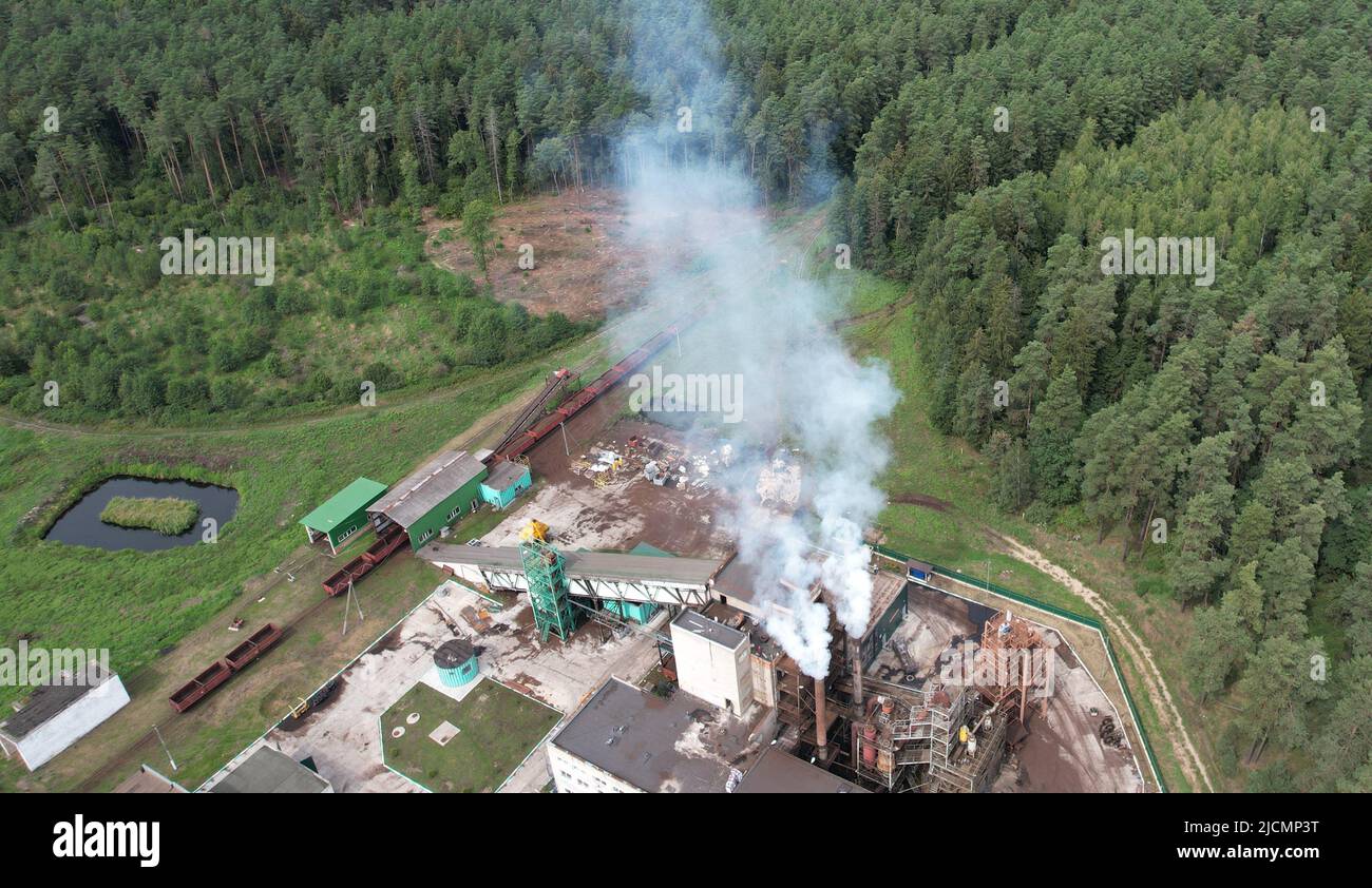 Toxic plant production theme. Smoke from factory aerial drone view Stock Photo
