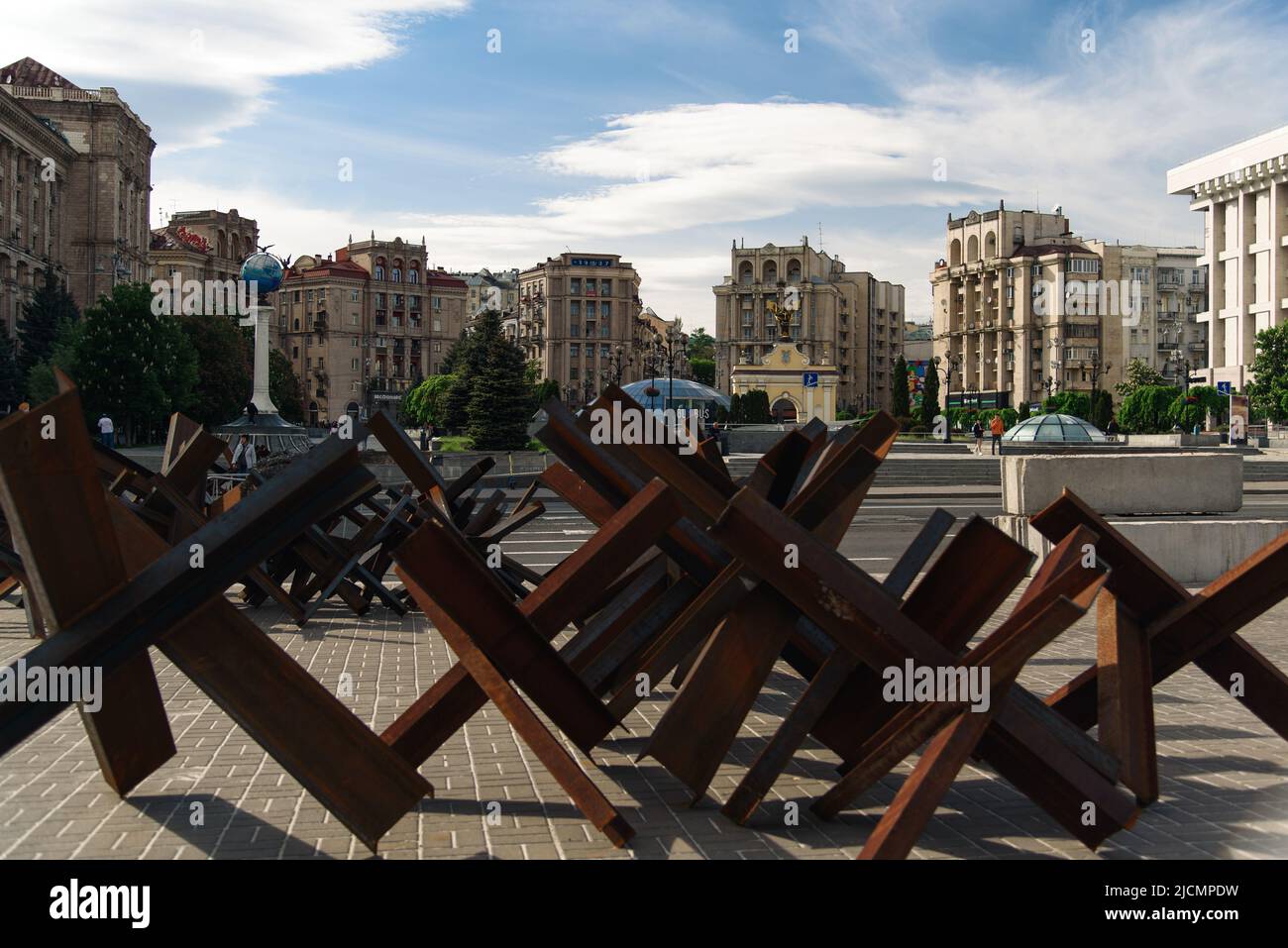 Kyiv, Ukraine - May 19, 2022: Maidan Nezalezhnosti. Anti-tank obstacles or czech hedgehogs during russian invasion of Ukraine. Selective focus Stock Photo