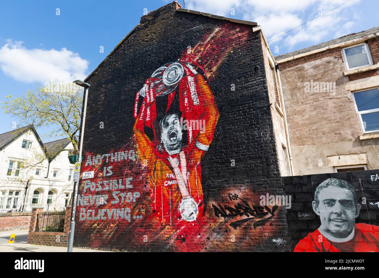 Mural of Jordan Henderson holding Premier League trophy, Liverpool FC street art, Sybil Road, Anfield, Liverpool, England, UK Stock Photo