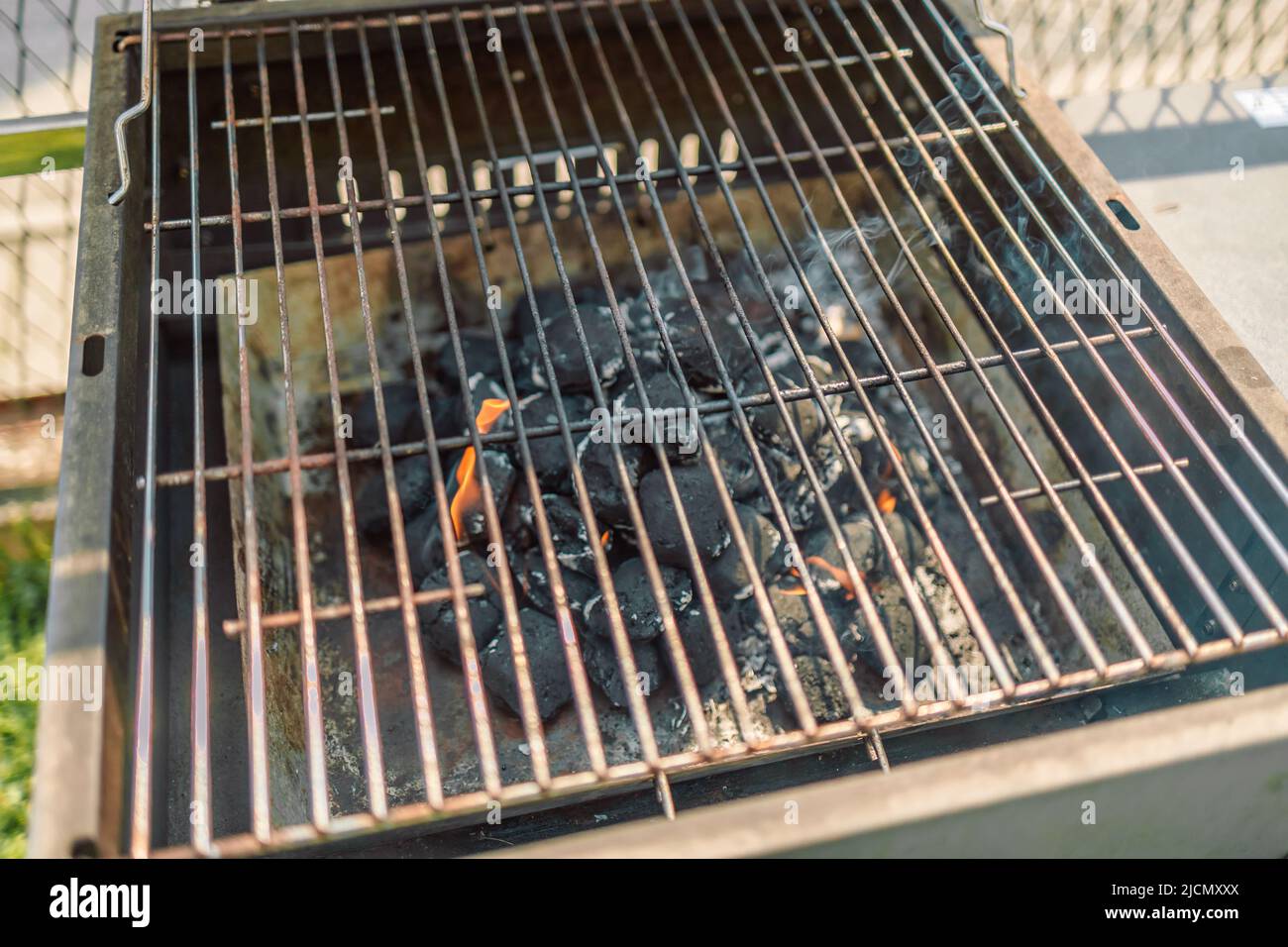 Barbecue fire grill. BBQ flaming charcoal grill. Hot barbeque charcoal
