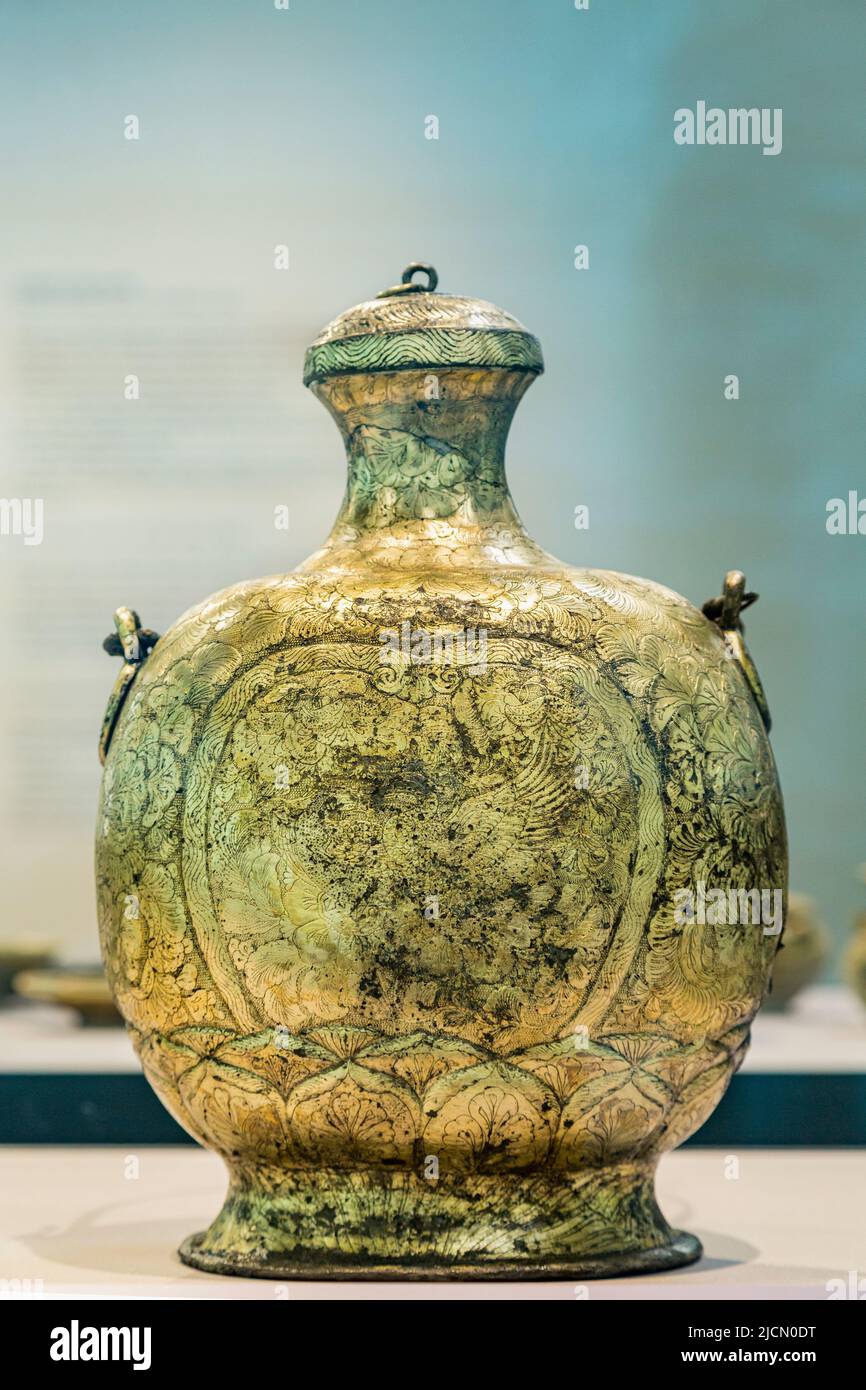 A Tang Dynasty, 618 - 907 AD, partly gilded silver wine flask made circa 830.  The piece is from the Tang Shipwreck, also known as the Belitung Shipwr Stock Photo