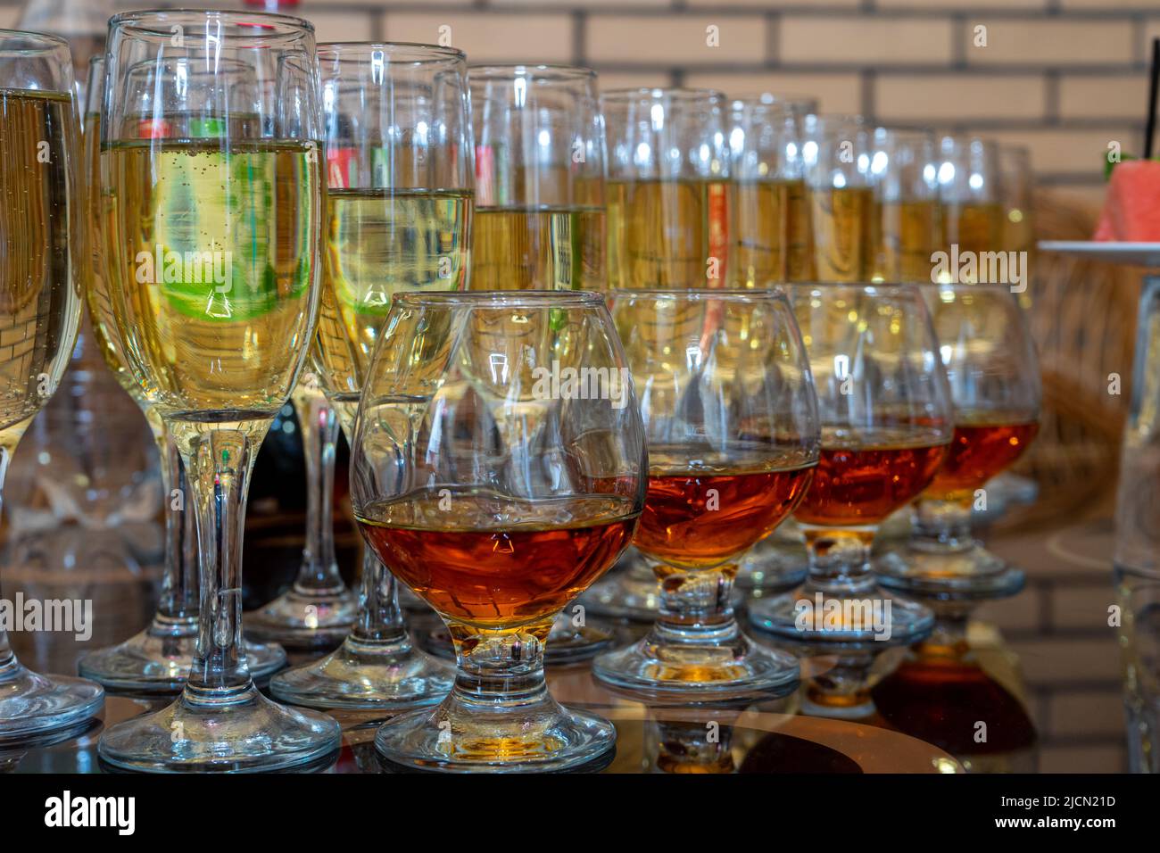 Lots of different glasses with white and red wine. Stock Photo