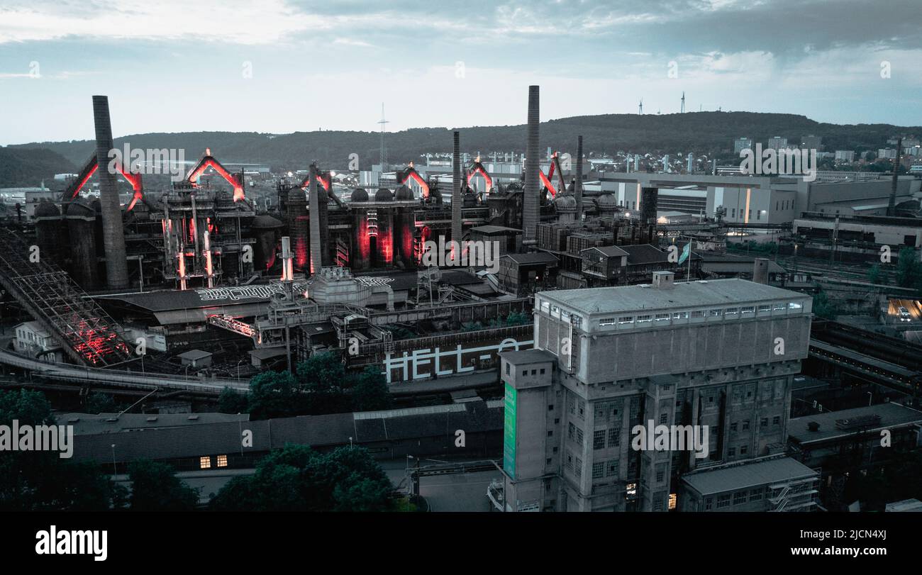 Aerial view of the Voelklingen Ironworks Unesco World Heritage Site red  with the night red lighting Stock Photo