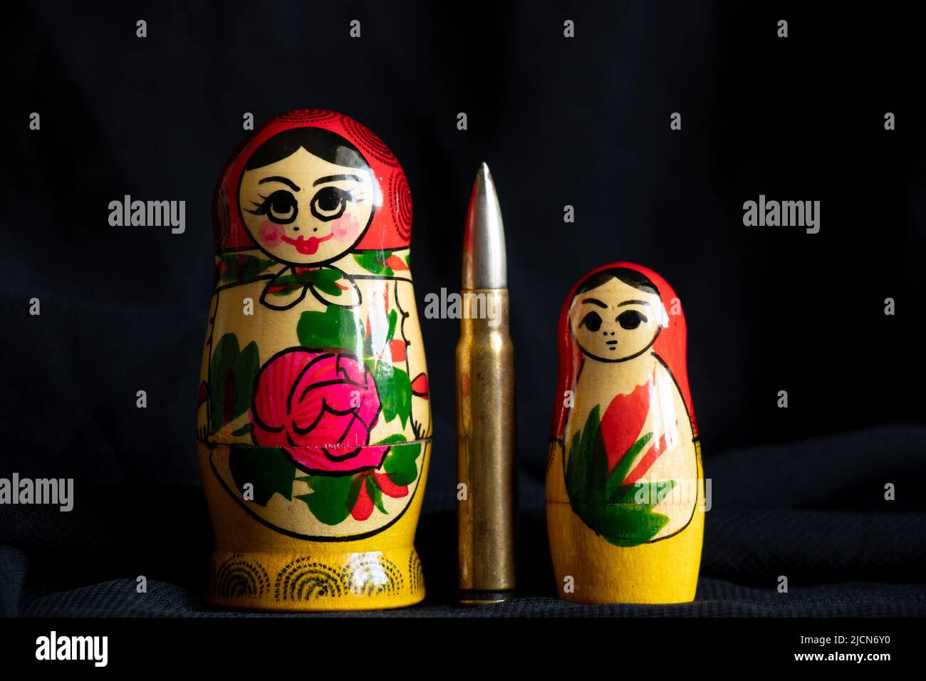 Russian nesting doll with a bullet inside, Russian aggressive culture, war in Ukraine with Russians 2022 Stock Photo
