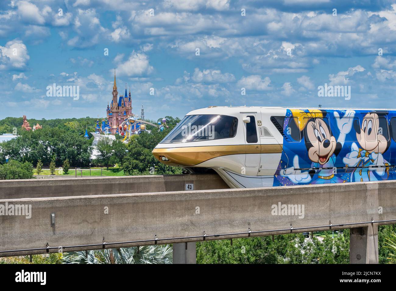Monorail Gold 50th celebration train at Disney World resort in Florida Stock Photo