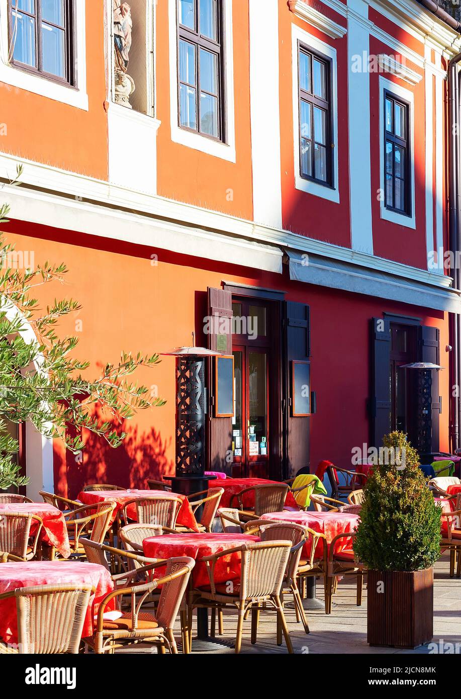 Street cafe view in the morning sunlight, Gyor, Hungary Stock Photo