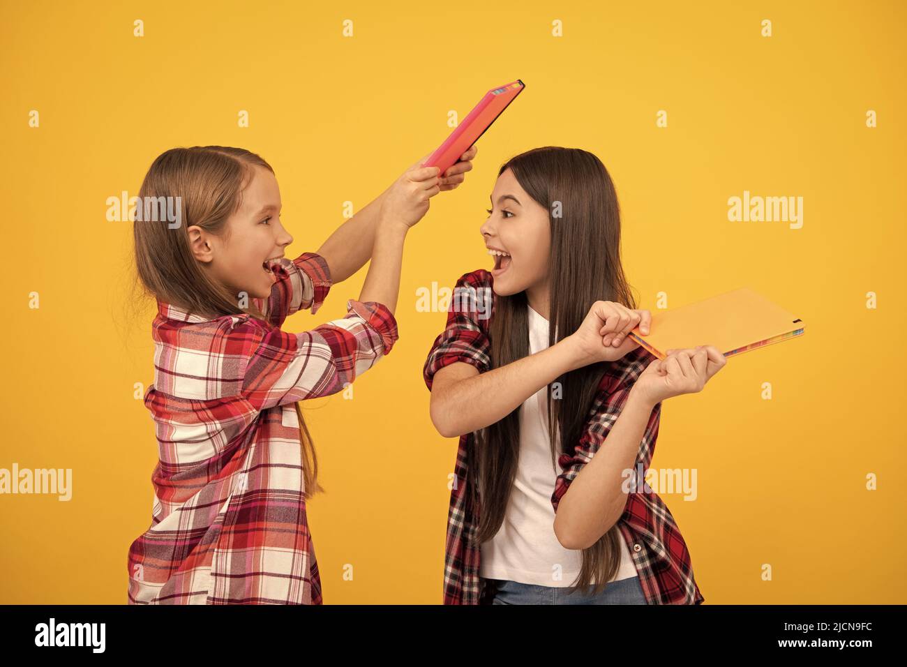 teens ready to study. happy childhood. cheerful kids going to do homework with books. Stock Photo