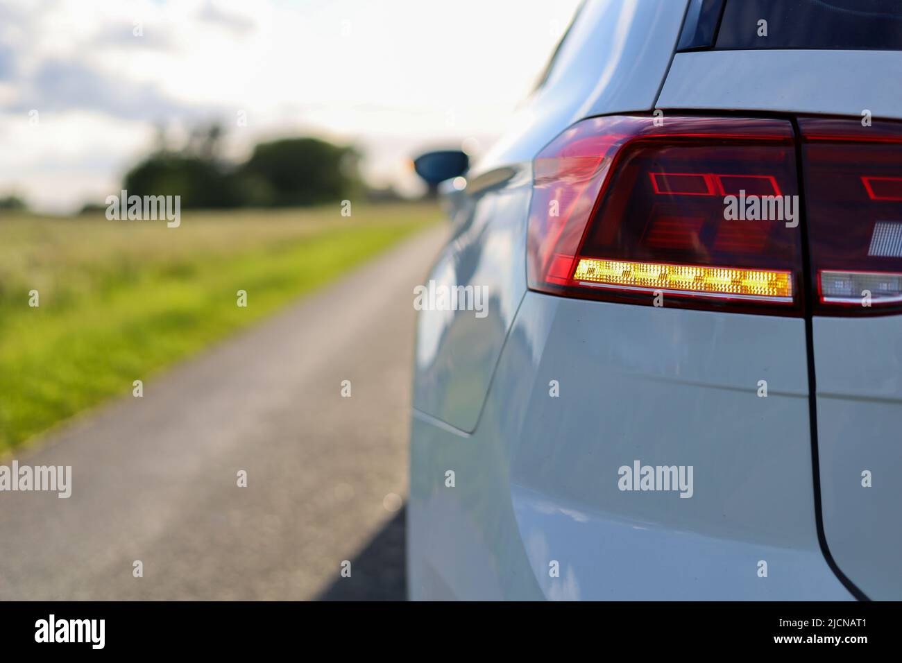Car with flashing lights. Volkswagen Passat Stock Photo