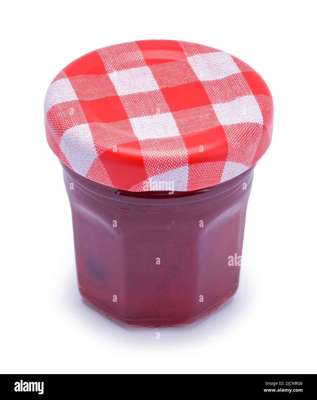 Small Jar of Strawberry Jam Cut Out on White. Stock Photo