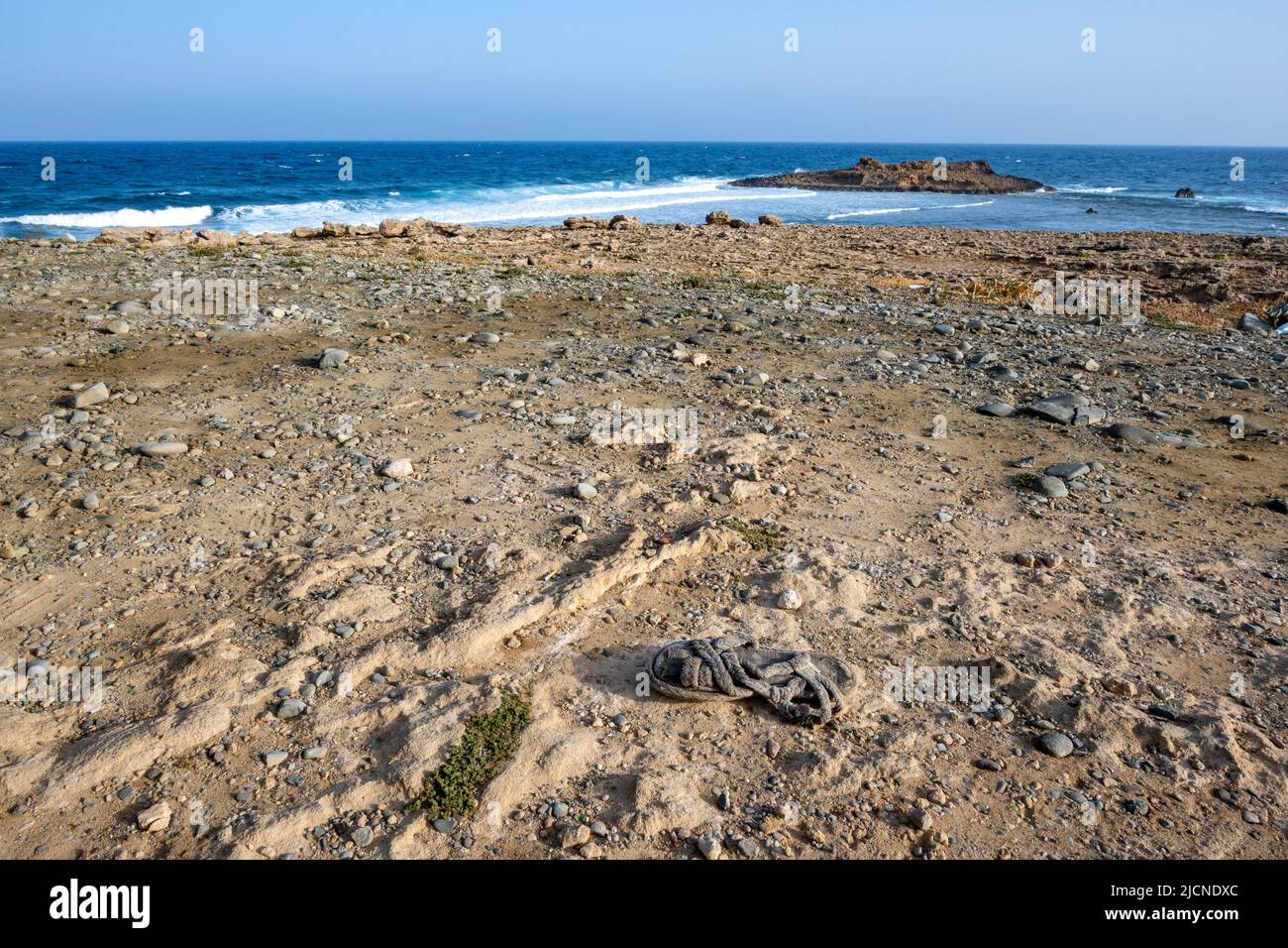 An old sandle left on the Mediterranean coast of Cyprus Island. Cyprus Stock Photo