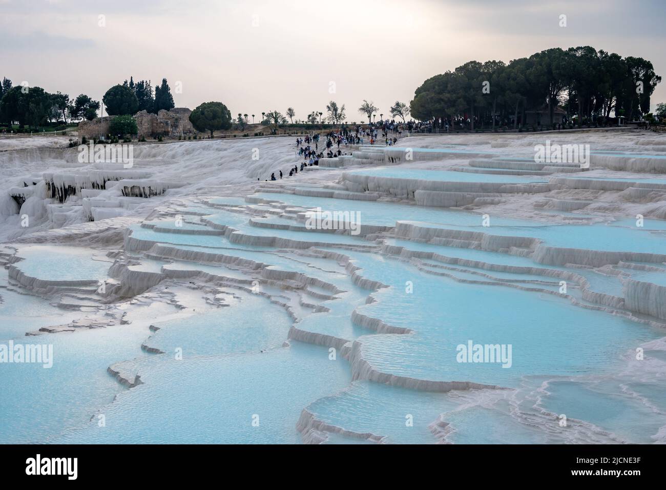 Thermal spring water pools on the travertines terraces. Pamukkale, Türkiye. Stock Photo