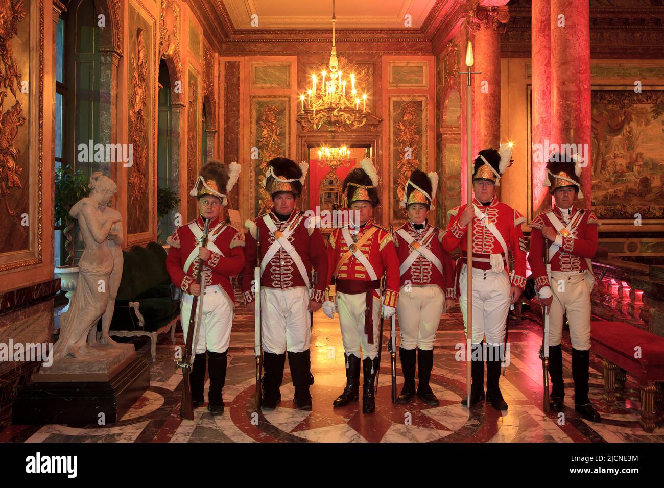 British Napoleonic era soldiers at the Duchess of Richmond's ball at Egmont Palace in Brussels, Belgium Stock Photo