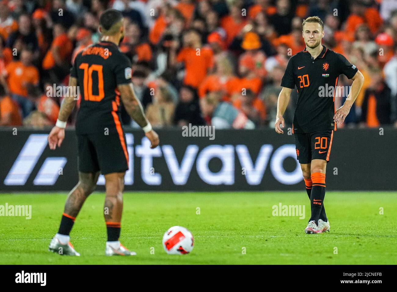 Rotterdam, Netherlands. 14 June 2022, Rotterdam, Netherlands. 14 June 2022, Memphis Depay of Holland and Teun Koopmeiners of Holland react to the 2-2 during the match between Holland v Wales at Stadion Feijenoord de Kuip on 14 June 2022 in Rotterdam, Netherlands. (Box to Box Pictures/Yannick Verhoeven) Stock Photo