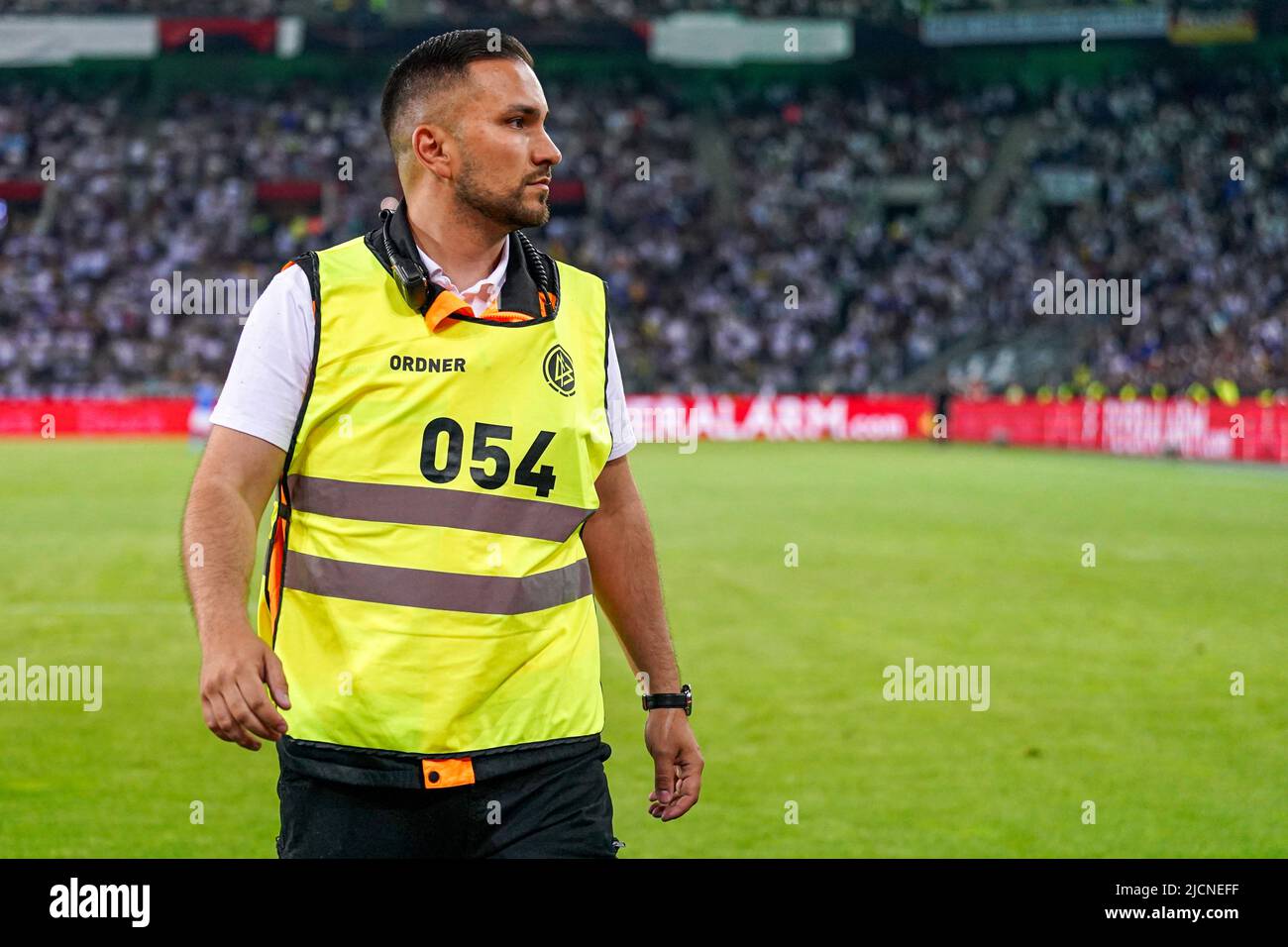 MöNCHENGLADBACH, GERMANY - JUNE 14: steward during the UEFA Nations League match between Germany and Italy at Borussia-Park on June 14, 2022 in Mönchengladbach, Germany (Photo by Joris Verwijst/Orange Pictures) Stock Photo