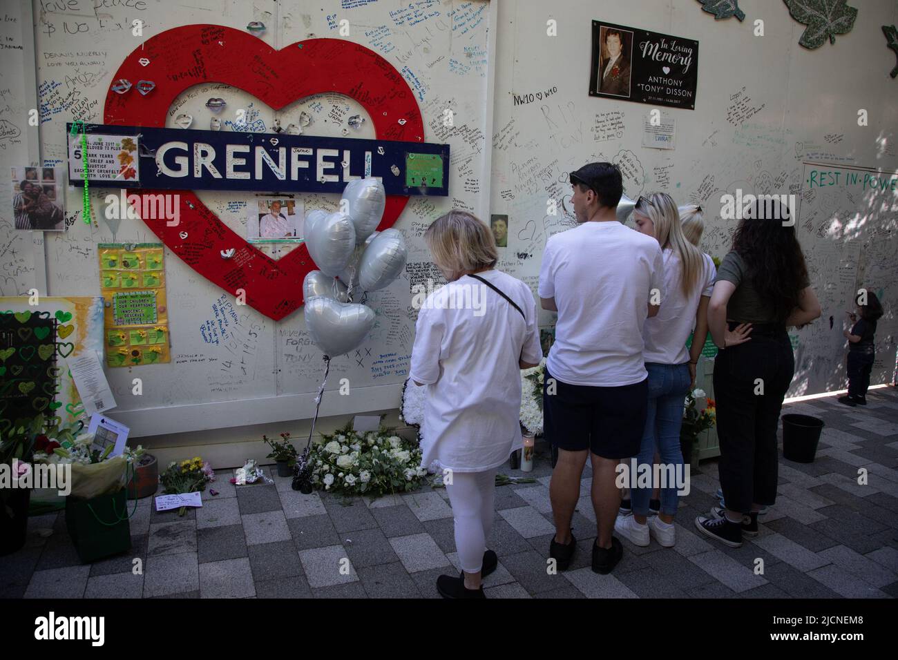 London, UK. 14th June 2022. Survivers and supporters have  gathered to mark the 5th anniversary of the Grenfell disaster and to remember the 72 people who lost their lives when a fire broke out at the block of flats in West London in 2017. Credit: Kiki Streitberger/Alamy Live News Stock Photo
