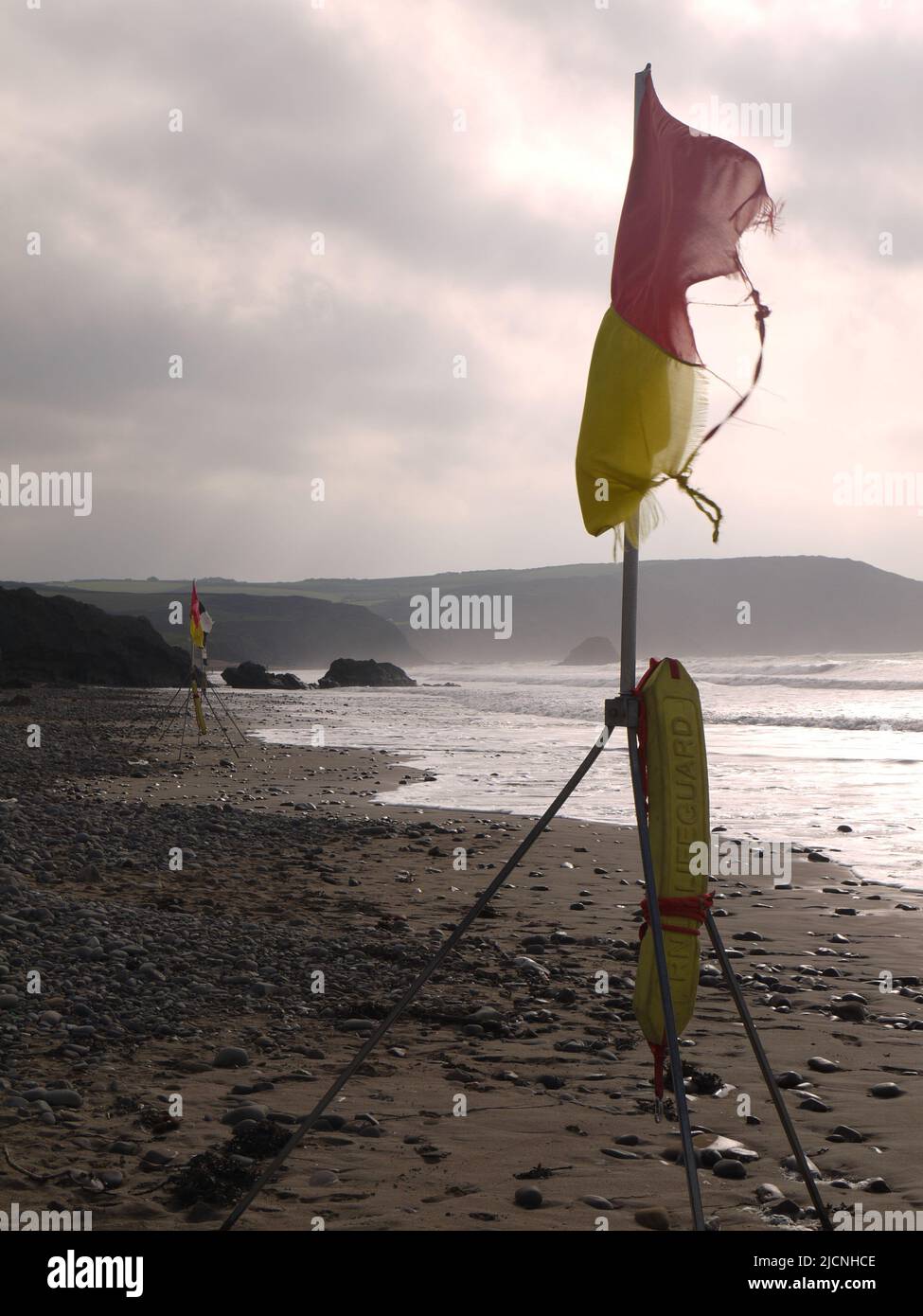 RNLI Safe to Swim Flags at Widemouth Bay, Cornwall, UK, during Storm