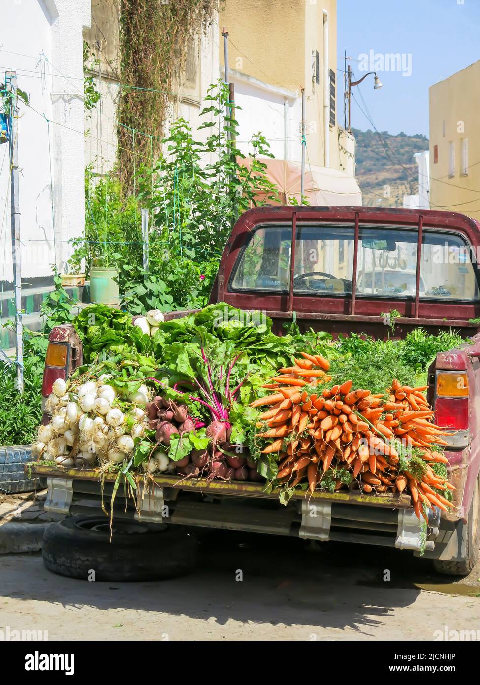 Pickup Truck Filled with Fresh Vegetables from the Farm Stock Photo