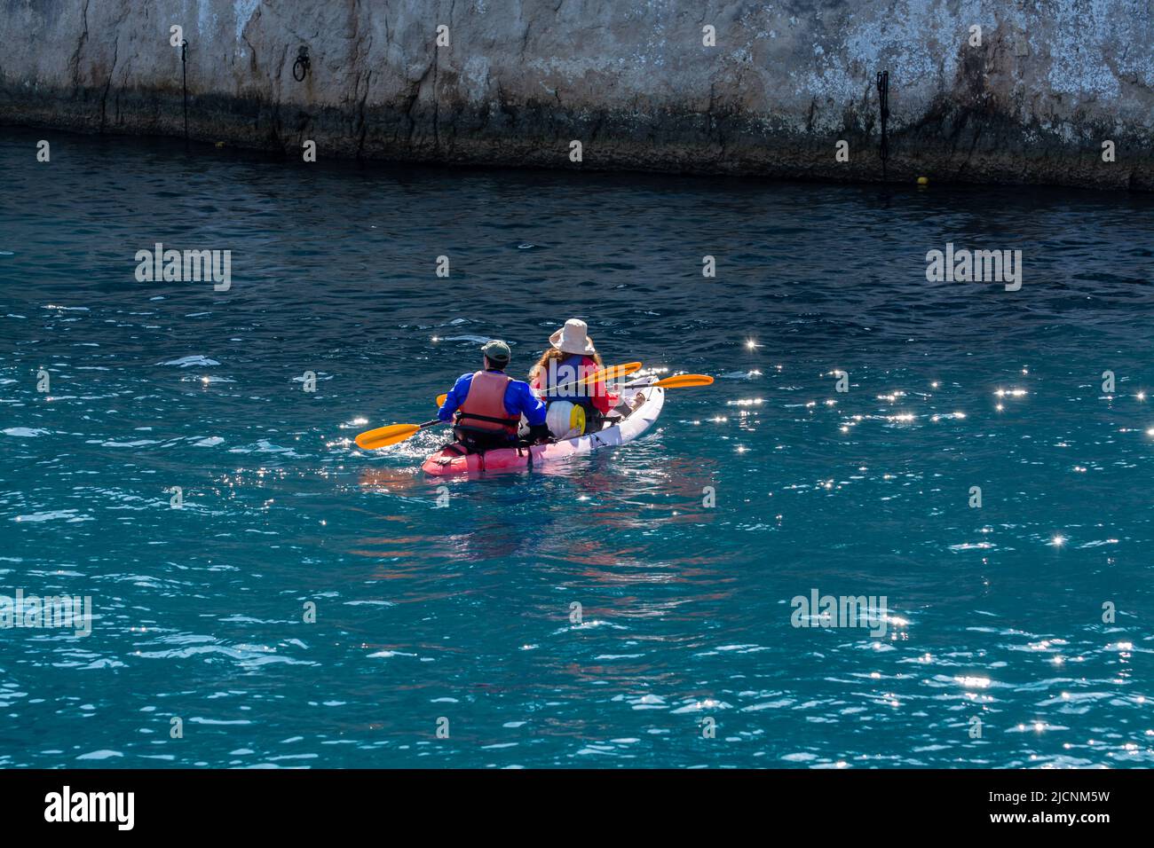Unidentified two sporters in kayak is Calanque de Port-Miou near Cassis,  excursion to Calanques national park in Provence, France Stock Photo - Alamy
