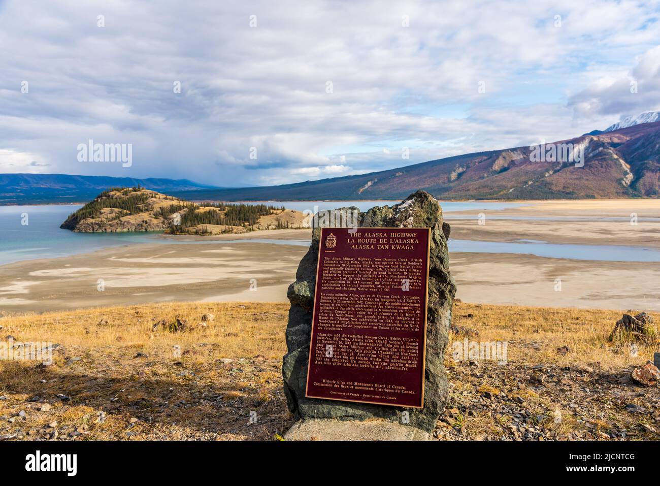 The Alaska Highway sign located at Destruction Bay, Haines Junction area during fall with