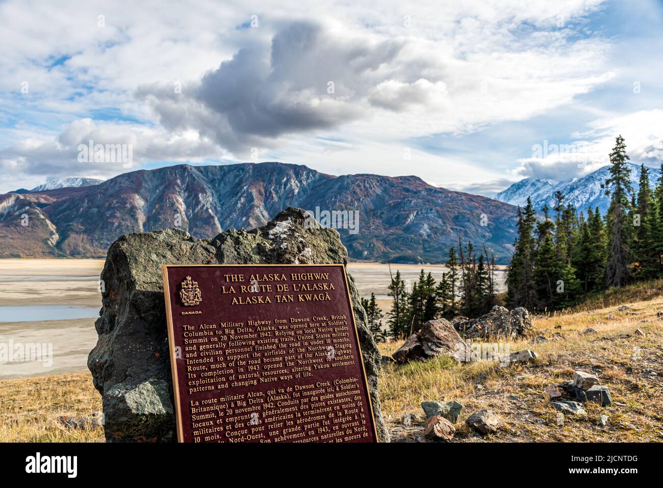 The Alaska Highway sign located at Destruction Bay, Haines Junction area during fall with