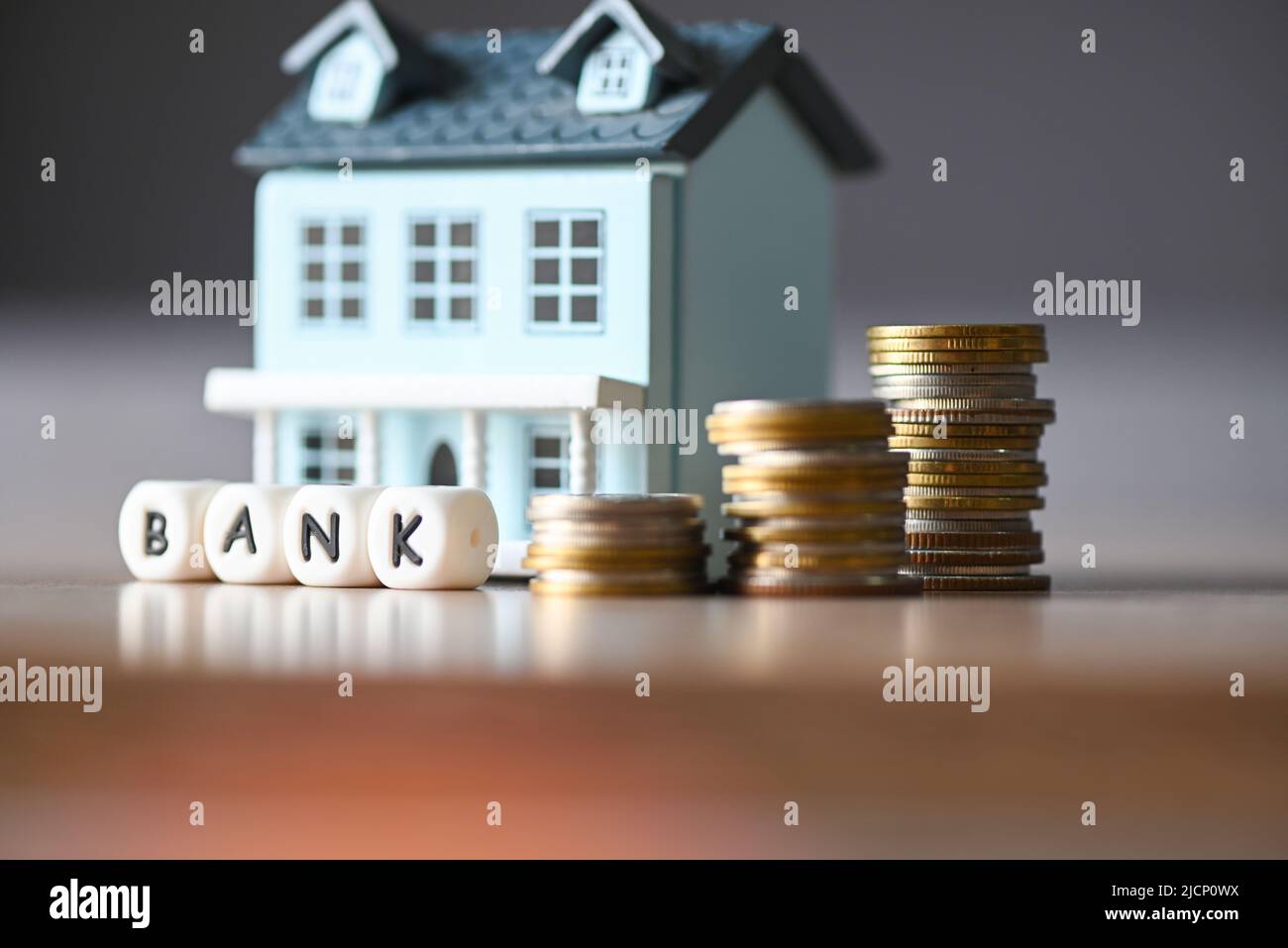 Save money or loan bank concept, coins stack money for buy a house