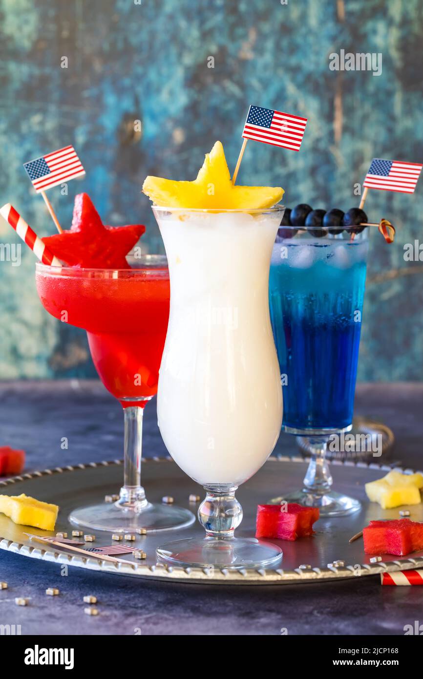 4th of July cocktails with fresh fruit and patriotic flag garnishments. Stock Photo