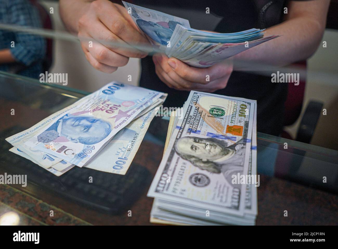 A man in the exchange office counts Turkish Lira. According to the data  published by the Turkish Statistical Institute (T‹?K) on June 3, annual  inflation was determined as 73.50. Inflation in Turkey