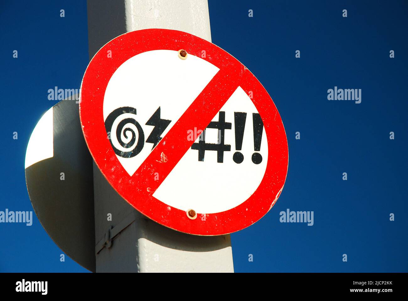 A sign, with comical symbols in Virginia Beach, requests the public refrain from cursing, cussing and using swear words raises First Amendment issues Stock Photo