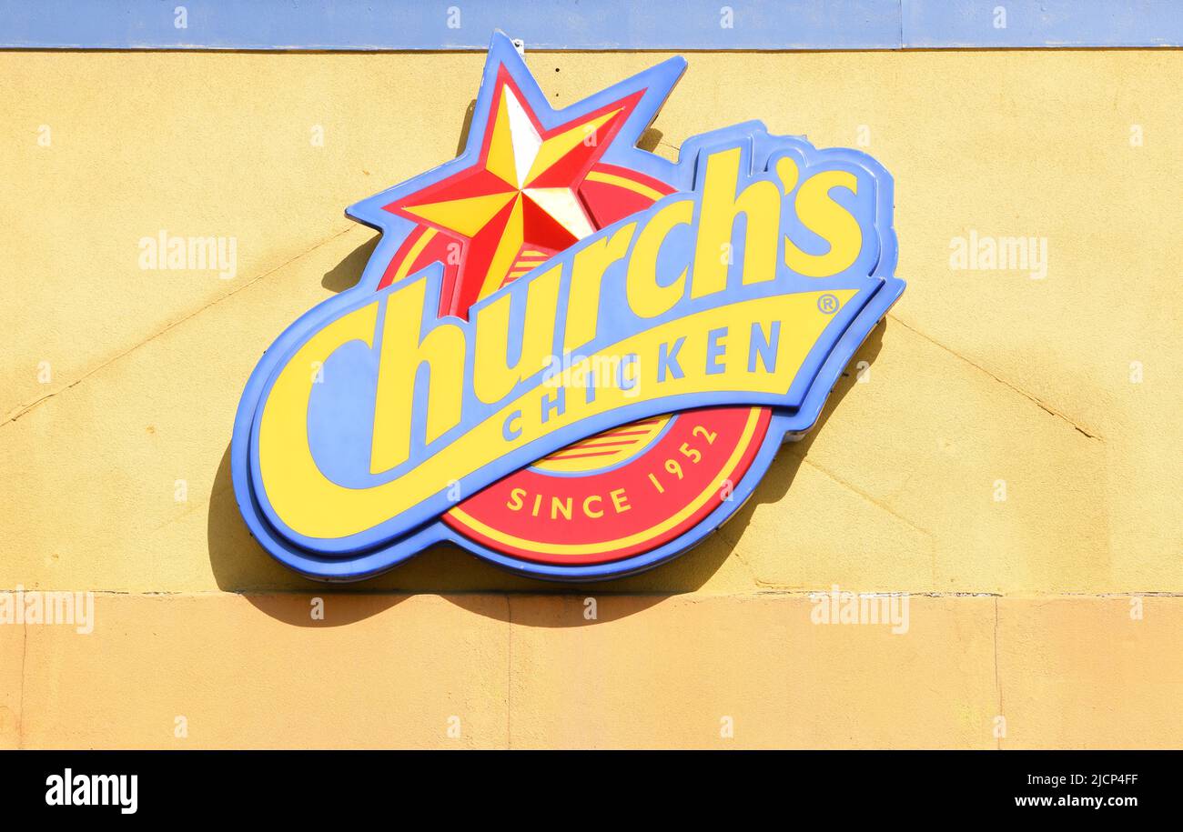 Close up of a yellow Church's Chicken sign Stock Photo