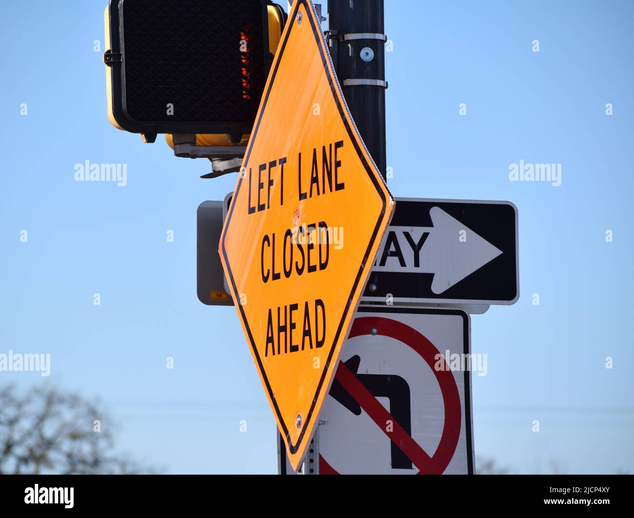 Left Lane Closed Ahead construction sign Stock Photo
