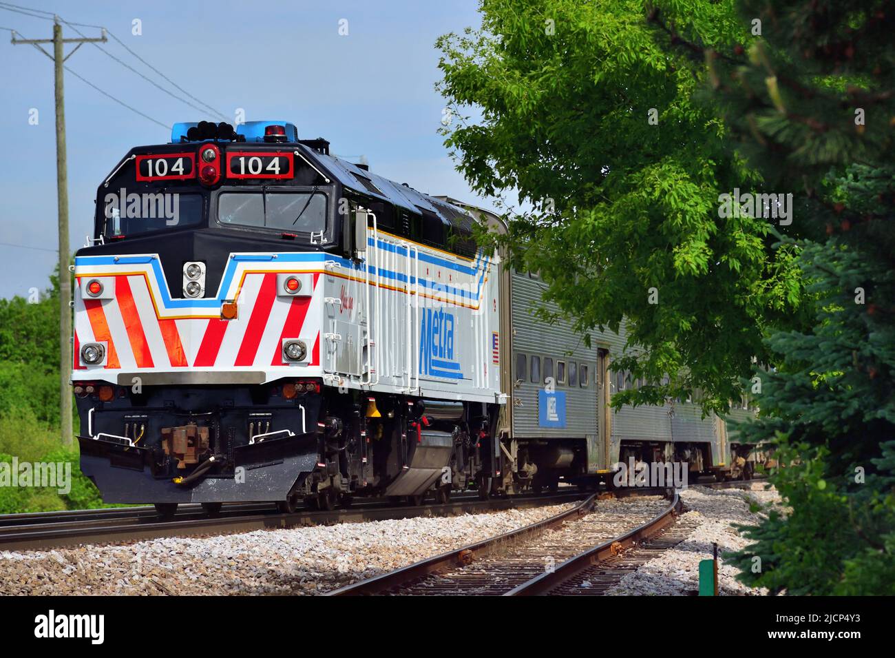 Bartlett, Illinois, USA. A Metra commuter train passing through suburbs on its journey to Chicago. Stock Photo