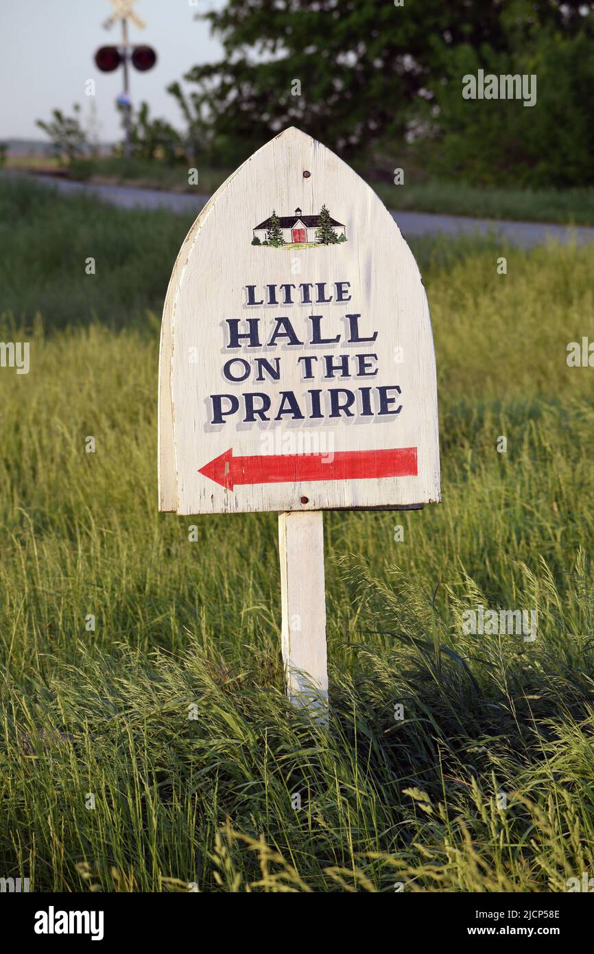 A sign showing the direction to the Little Hall on the Prairie in Murdock Illinois Stock Photo
