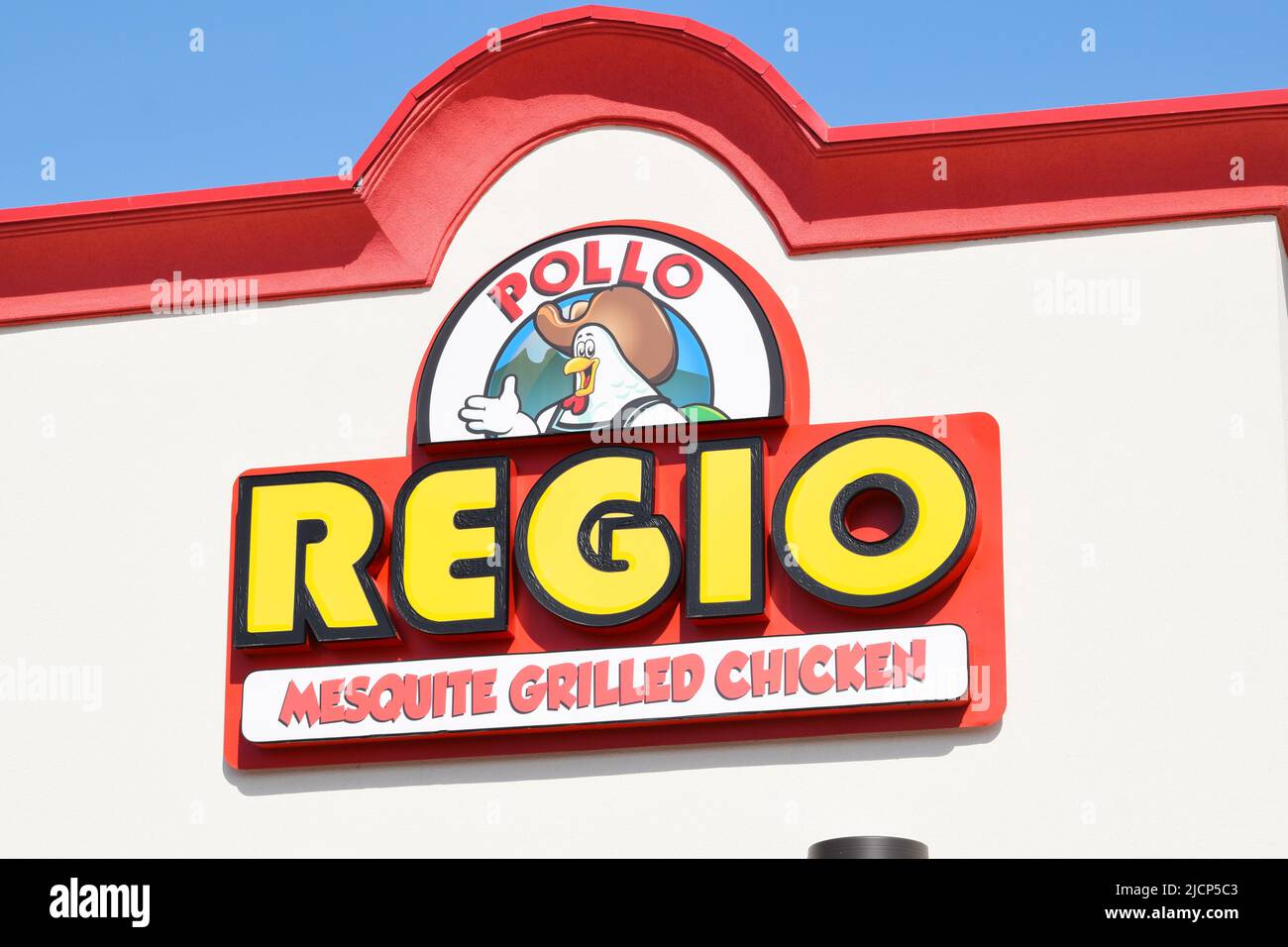Close up of a Pollo Regio Mesquite Grilled Chicken restaurant sign Stock Photo