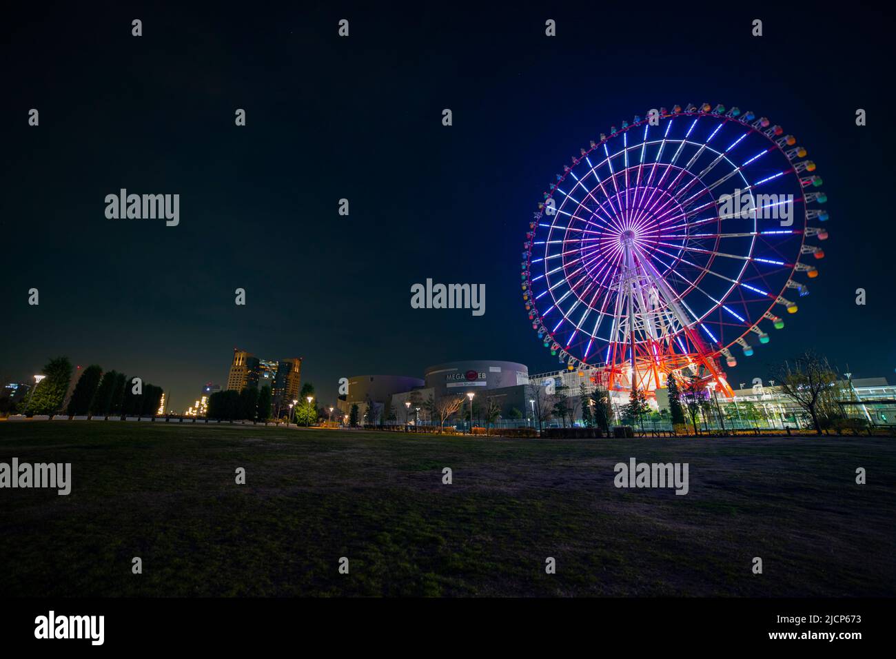 Ferris wheel at night in the amusement park Stock Photo - Alamy